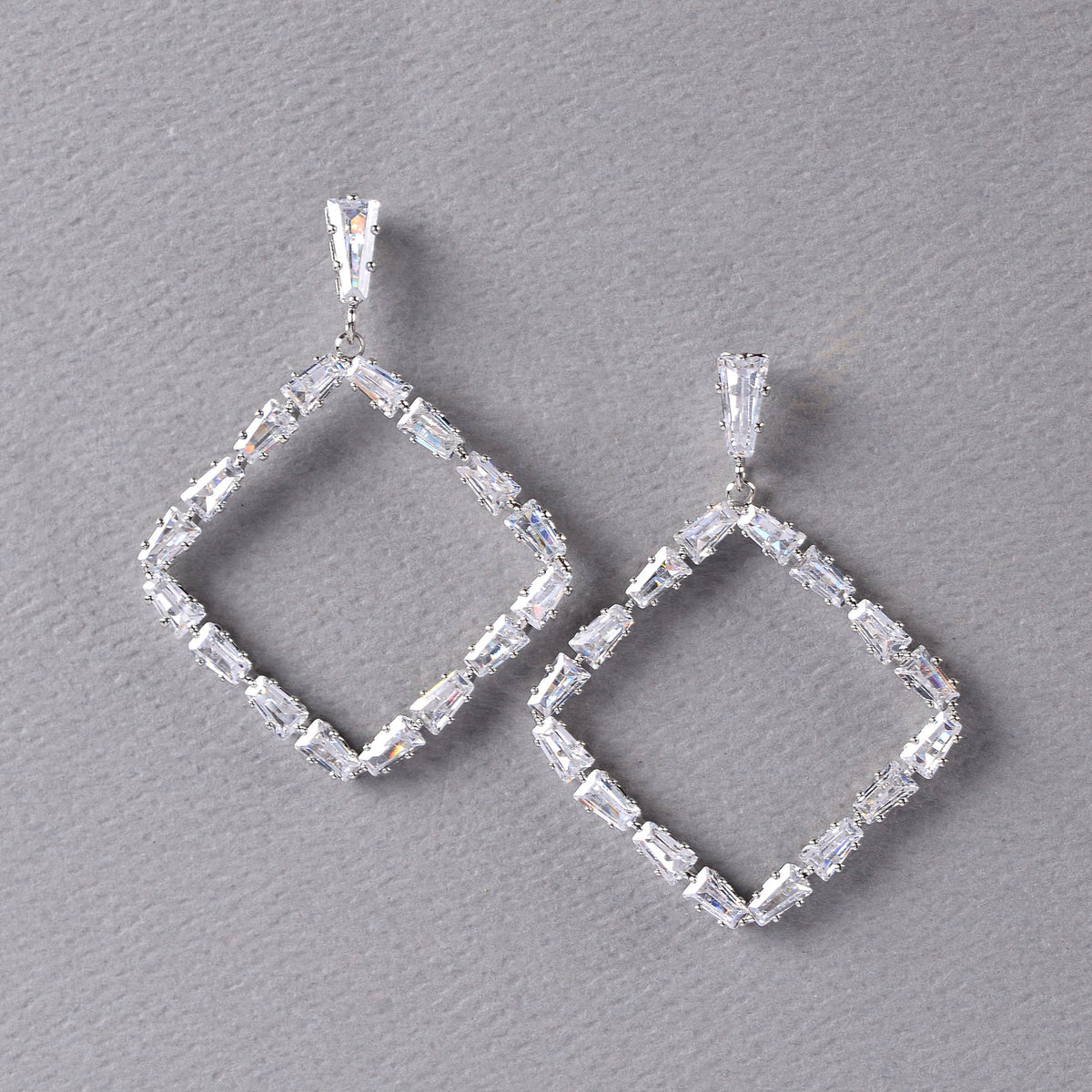 Glowria Star- Stone Studded Zirconia Dangler Earrings